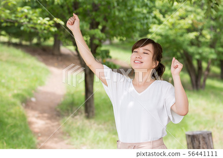 A woman in fresh green A woman in fresh green 56441111