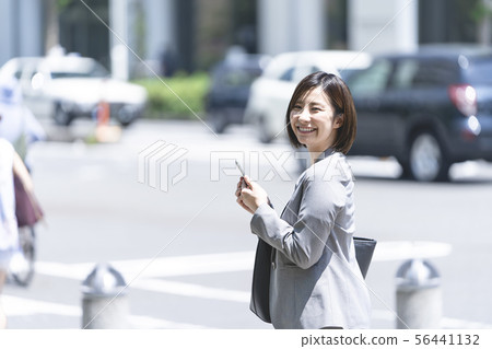 20's business woman smartphone 20's business woman smartphone 56441132