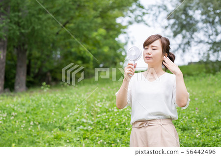 A woman in fresh green 56442496