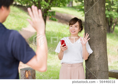 A woman in fresh green A woman in fresh green 56446018