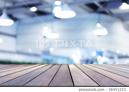 Wooden board with empty space and blurred cafe 56451253