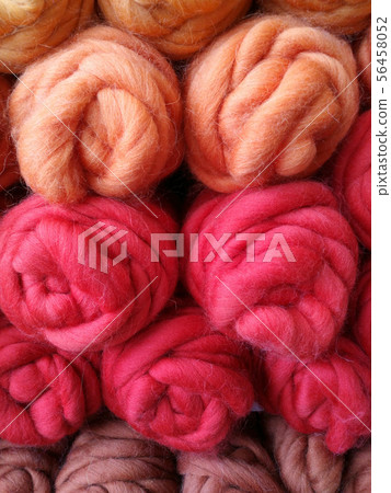 Beautiful colored wools ball. Wool texture. Yarn 56458052