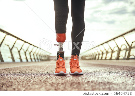 Amputated Woman. Image of a Beautiful Young Woman Doing Slopes and  Stretching Prosthetic Leg on a Bridge Near Sea Stock Image - Image of  adult, athletic: 231468331