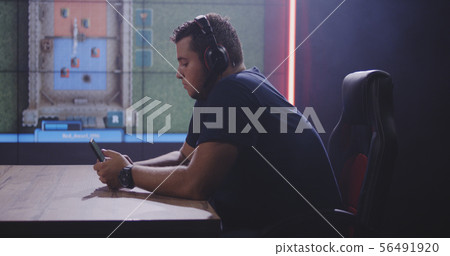 Two men playing mobile games at a tournament 56491920