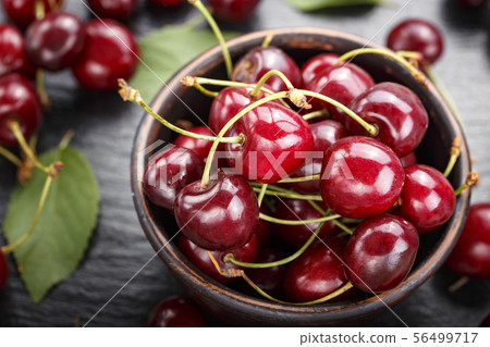 sweet cherries in a plate 56499717