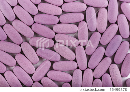 pills scattered as a background 56499878