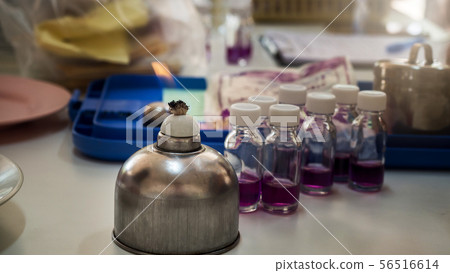Alcohol burner and test tube in rack Alcohol burner and test tube in rack 56516614
