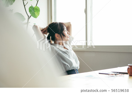 A woman taking a break A woman taking a break 56519638