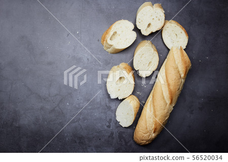 Homemade fresh sliced bread on table Homemade fresh sliced bread on table 56520034