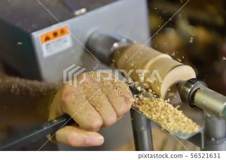 During woodworking lathe processing 56521631