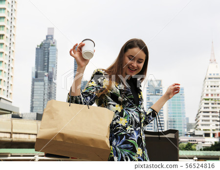 Beautiful woman business shopping in the city. Beautiful woman business shopping in the city. 56524816