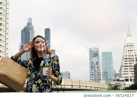 Beautiful woman business shopping in the city. Beautiful woman business shopping in the city. 56524817