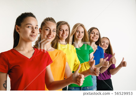 Young women weared in LGBT flag colors isolated on white background, LGBT pride concept 56529953