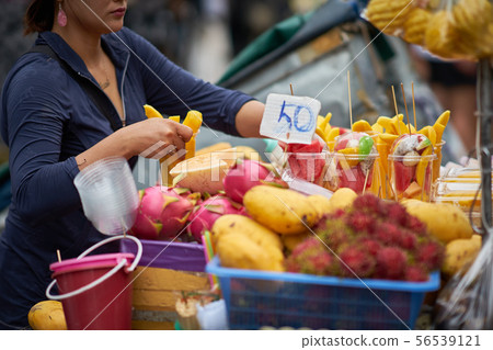 Selling fruits on the street Selling tropical fruits on the street 56539121