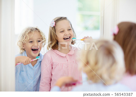 Child brushing teeth. Kids with toothpaste, brush. Child brushing teeth. Kids with toothpaste, brush. 56543387