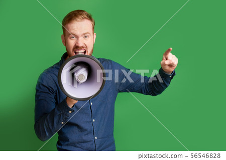 Man shouting in megaphone Man shouting in megaphone 56546828