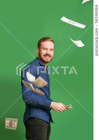 Rich man throwing money Rich man throwing money 56546864