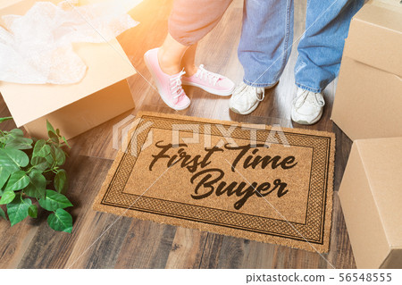 Man and Woman Unpacking Near First Time Buyer Mat Man and Woman Unpacking Near First Time Buyer Mat 56548555