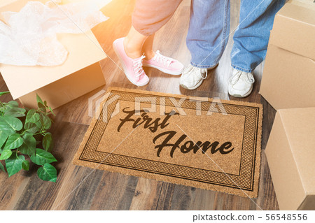 Man and Woman Unpacking Near First Home Mat Man and Woman Unpacking Near First Home Mat 56548556