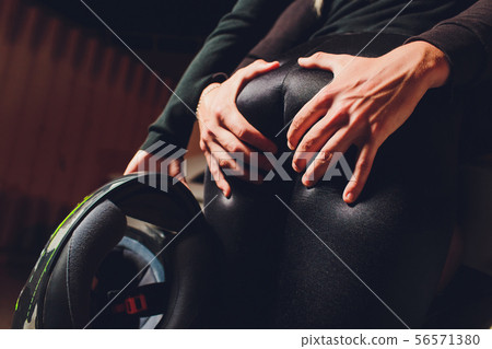Young girl in leather jacket and leggings sitting on motorcycle, seductive slim biker girl with Young girl in leather jacket and leggings sitting on motorcycle, seductive slim biker girl with 56571380