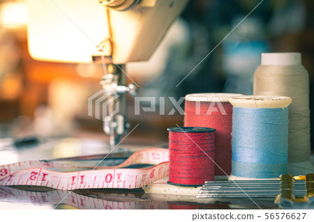 Thread with a cloth strap on a sewing machine 56576627