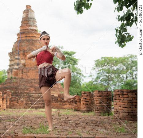 Muay Thai woman and Healthy concept. 56580723