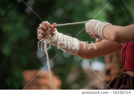 Muay Thai woman and Healthy concept. Muay Thai woman and Healthy concept. 56580724