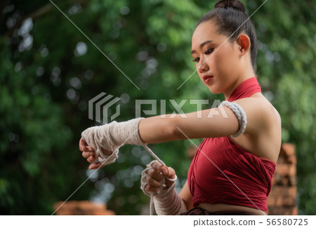Muay Thai woman and Healthy concept. 56580725