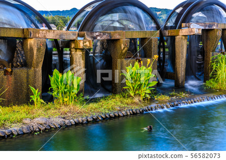Asakura Triple watermill mural in operation, evening view [Asakura City, Fukuoka Prefecture] 56582073