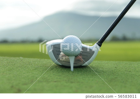 Golf ball and golf club in beautiful golf course a 56583011