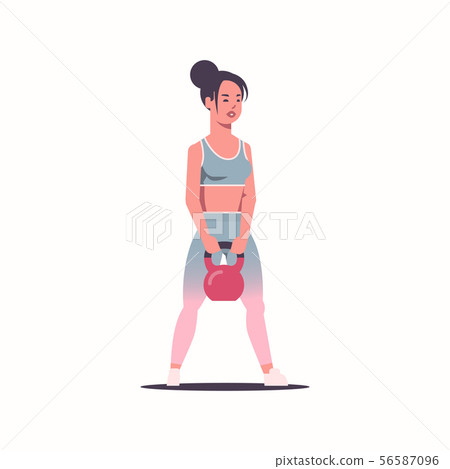 sporty girl doing exercises with kettlebell weight attractive woman training workout healthy sporty girl doing exercises with kettlebell weight attractive woman training workout healthy 56587096