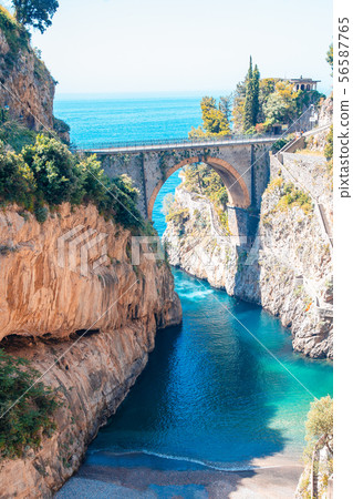 Famous fiordo di furore beach seen from bridge. 56587765