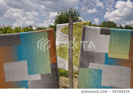 Wash-line in open space under the sky 56588434