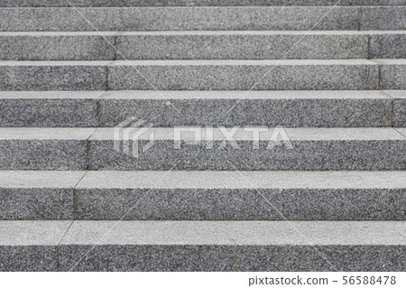 Grey cobblestone stairs in the city, background with grunge texture 56588478