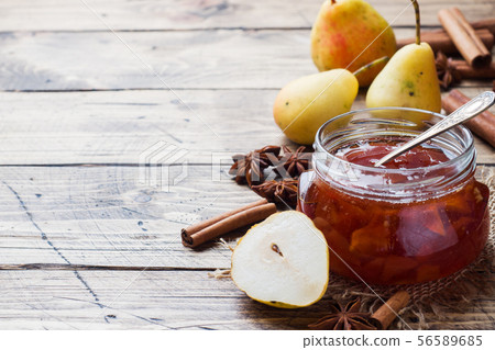 Homemade pear jam in a jar and fresh pears  56589685