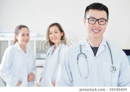 Happy Vietnamese general practitioner 56590404