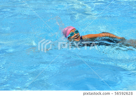 Girl swimming in the pool (crawl) 56592628