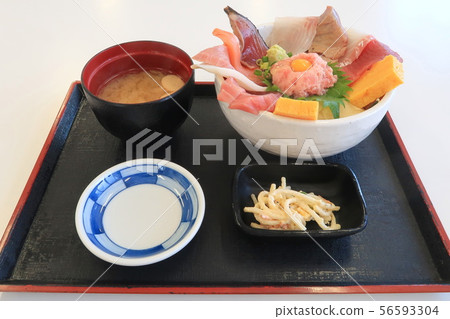 Bowl of rice topped with sashimi Bowl of rice topped with sashimi 56593304