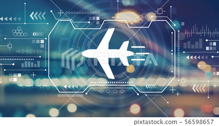 Airplane travel theme with blurred city lights 56598657