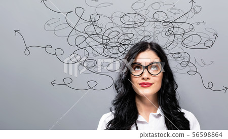 Solving a problem concept with young businesswoman 56598864