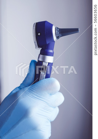 doctor with the otoscope doctor with the otoscope 56603656