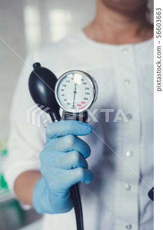 doctor with medical blood pressure doctor with medical blood pressure 56603663
