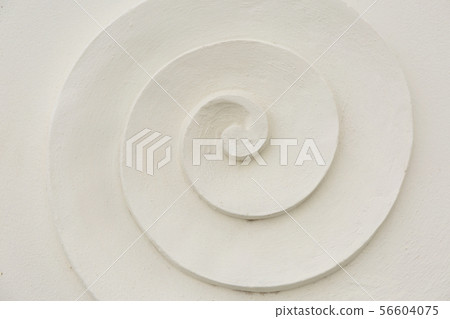 White plaster spiral. Macro background. White plaster spiral. Macro background. 56604075
