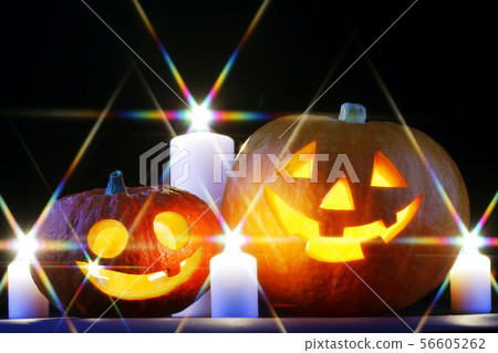 Halloween pumpkins and candles Halloween pumpkins and candles 56605262