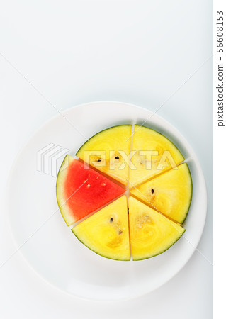 Pieces of red and yellow watermelon in a white 56608153