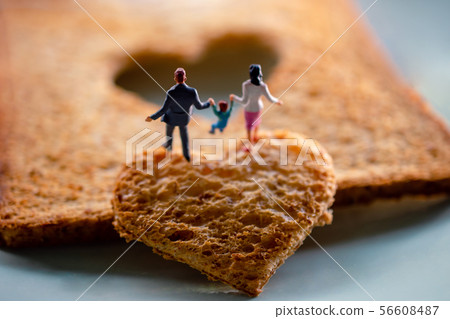 Love Concept. Miniature of Happy Family Walking on 56608487