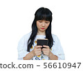 Cute Asian Girl Using Mobile Phone with Serious 56610947