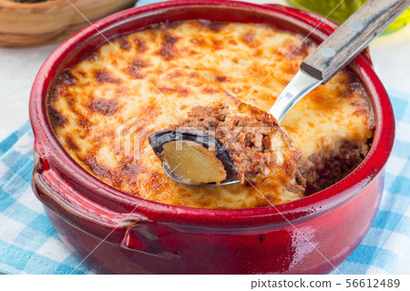 Greek dish moussaka made in a traditional ceramic 56612489