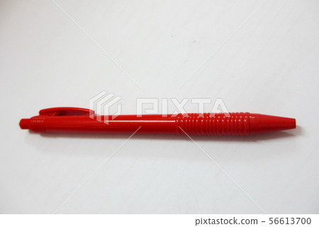 Red handle ballpoint pen made of plastic 56613700
