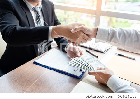 Bribery and corruption, Businessman hand giving Bribery and corruption, Businessman hand giving 56614113